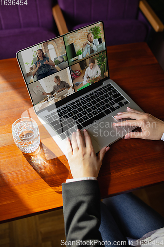 Image of Remote working. Workplace in bar, restaurant office with PC, devices and gadgets.