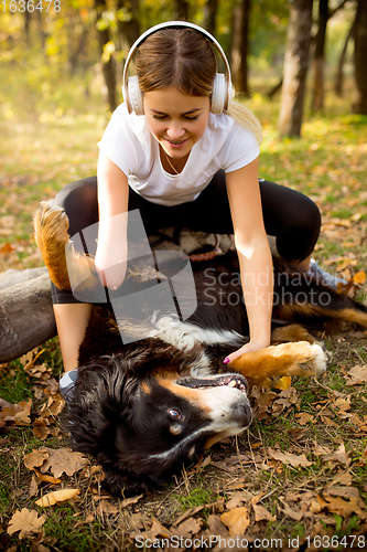 Image of Disabled woman walking down and training outdoors in forest