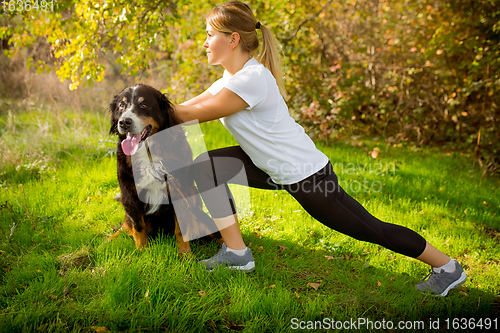 Image of Disabled woman walking down and training outdoors in forest