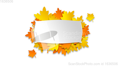 Image of White sheet with copyspace on bunch of autumn golden-orange leaves isolated on white background