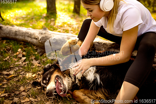 Image of Disabled woman walking down and training outdoors in forest