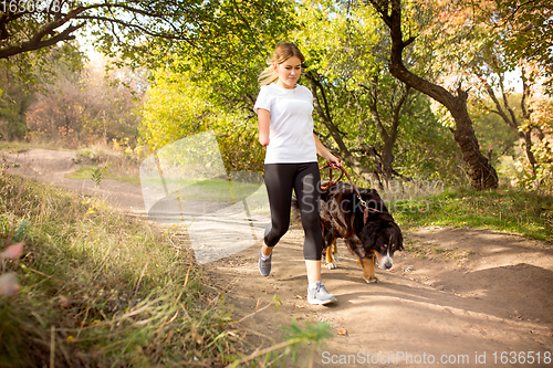 Image of Disabled woman walking down and training outdoors in forest