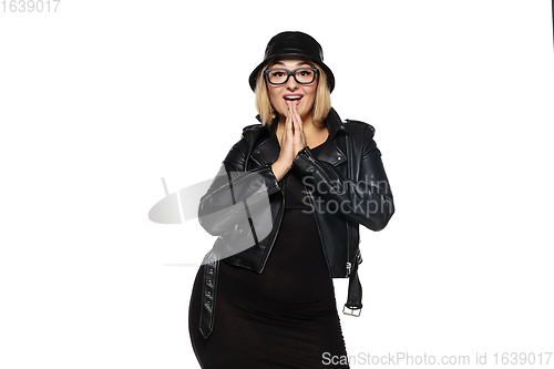 Image of Beautiful young woman in black attire, stylish outfit isolated on white studio background