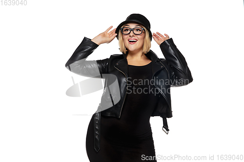 Image of Beautiful young woman in black attire, stylish outfit isolated on white studio background