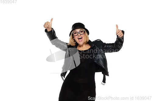 Image of Beautiful young woman in black attire, stylish outfit isolated on white studio background