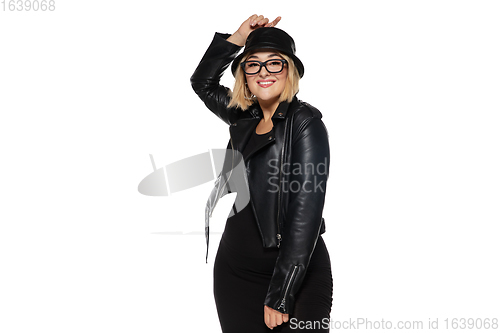 Image of Beautiful young woman in black attire, stylish outfit isolated on white studio background