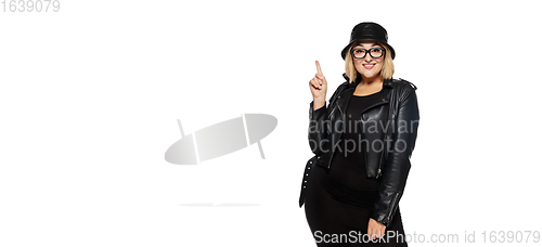 Image of Beautiful young woman in black attire, stylish outfit isolated on white studio background