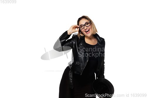 Image of Beautiful young woman in black attire, stylish outfit isolated on white studio background