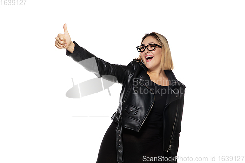 Image of Beautiful young woman in black attire, stylish outfit isolated on white studio background