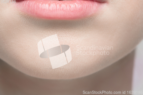 Image of Close up portrait of beautiful albino woman isolated on studio background. Beauty, fashion, skincare, cosmetics concept. Details.