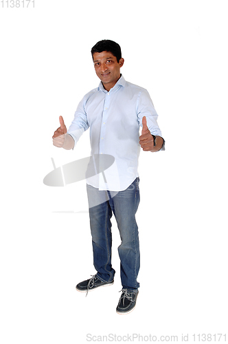 Image of Handsome man standing with his thumps up
