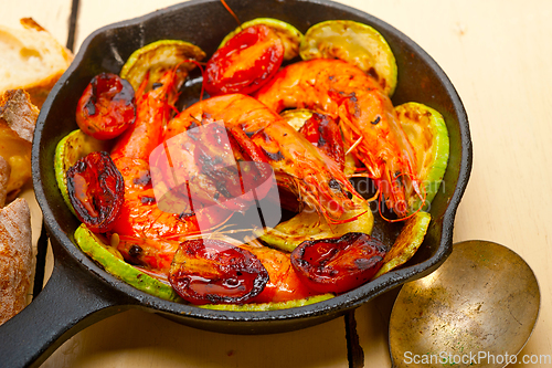 Image of roasted shrimps with zucchini and tomatoes