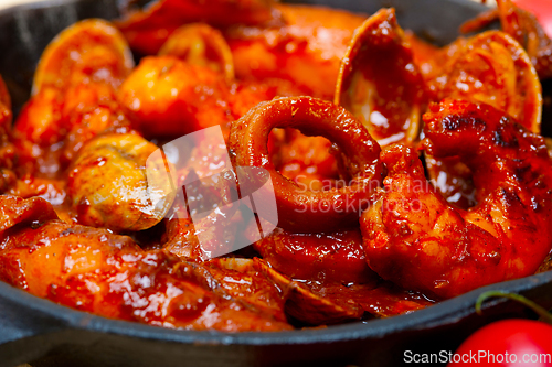 Image of fresh seafoos stew on an iron skillet