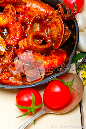 Image of fresh seafoos stew on an iron skillet