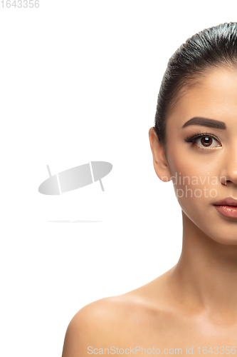 Image of Beautiful young woman\'s portrait isolated white background. Cosmetics and makeup, natural and eco treatment, skin care.