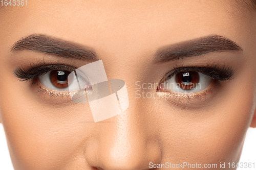 Image of Close up young woman\'s portrait isolated white background. Cosmetics and makeup, natural and eco treatment, skin care.