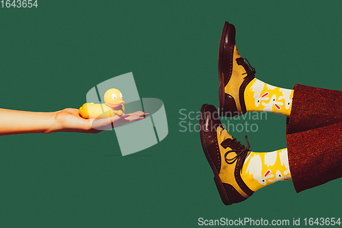 Image of Modern art collage in pop-art style. Hands isolated on trendy colored background with copyspace, contrast