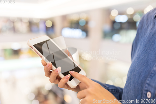 Image of Woman touch on cellphone 