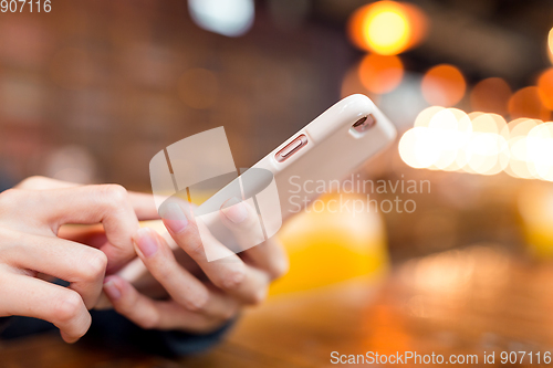 Image of Woman use of mobile phone