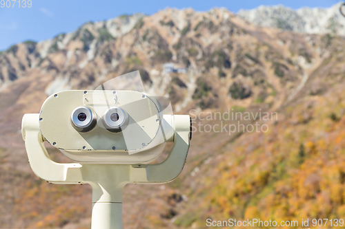 Image of Binocular viewer in natural landscape