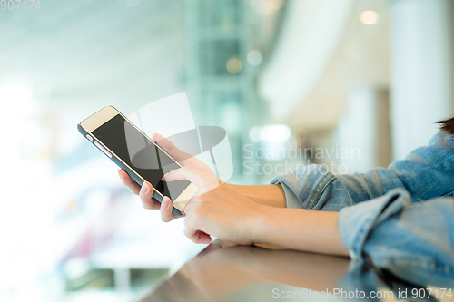 Image of Woman use of mobile phone