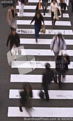 Image of People crossing the street