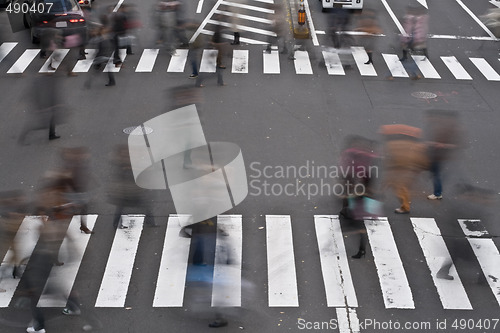 Image of People crossing the street