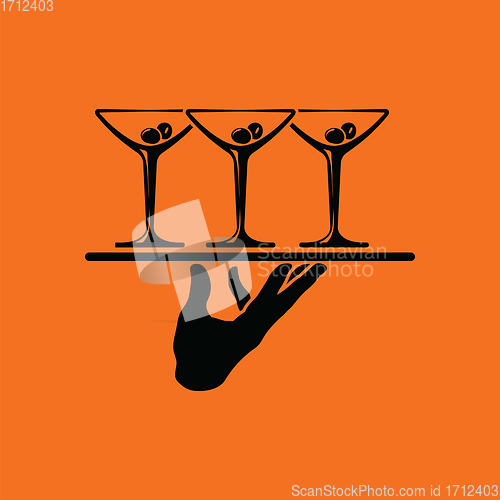 Image of Waiter hand holding tray with martini glasses icon