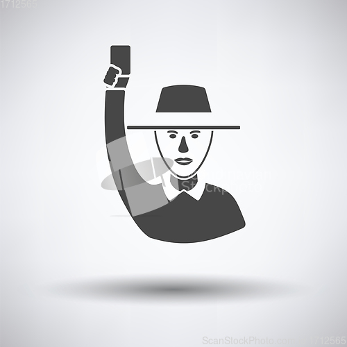 Image of Cricket umpire with hand holding card icon