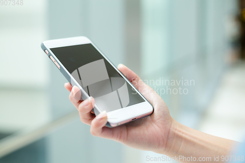 Image of Woman use of mobile phone