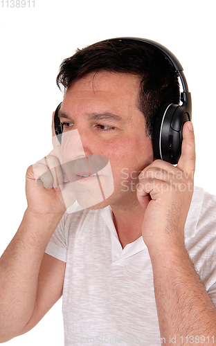Image of Man enjoying listening to music