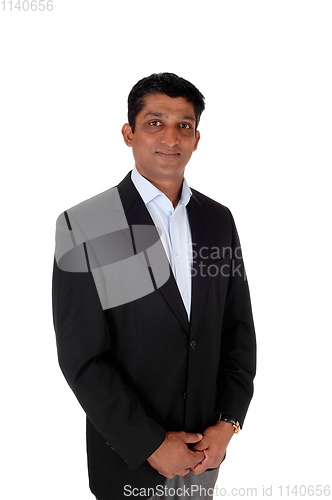 Image of Middle age business man in a dark suit jacket 