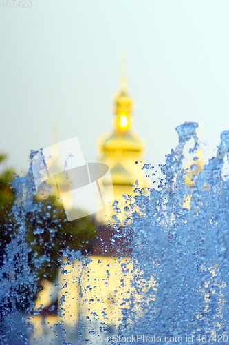 Image of fountains on the background of golden domes