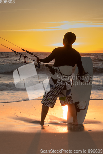 Image of Kite surfer watching the waves