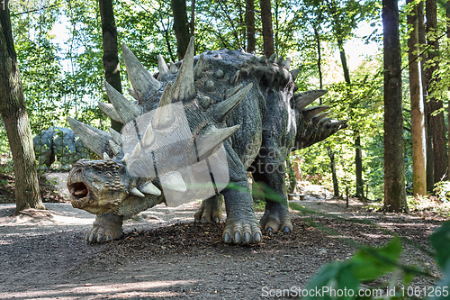 Image of prehistoric dinosaur like stegosaurus in nature