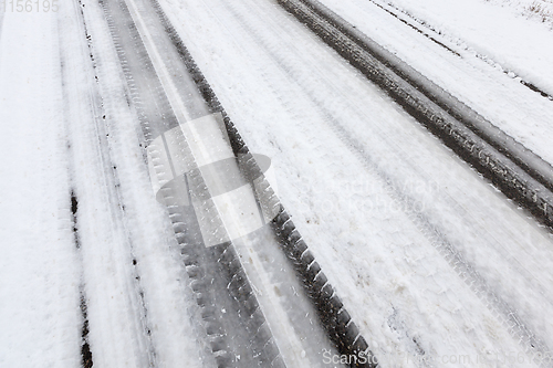 Image of Tracks on the road