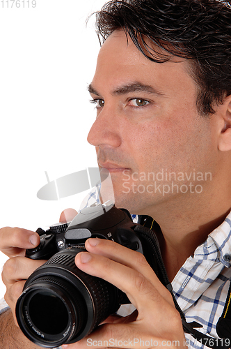 Image of A young man holding his camera for a shoot