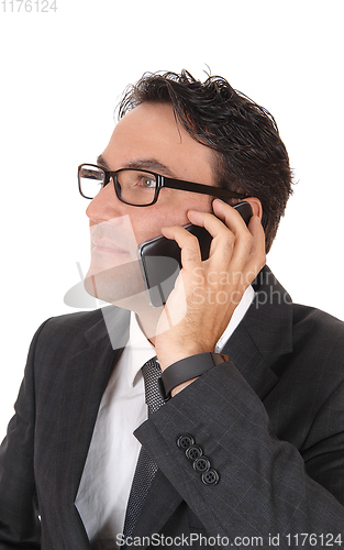 Image of Business man talking on the cell phone