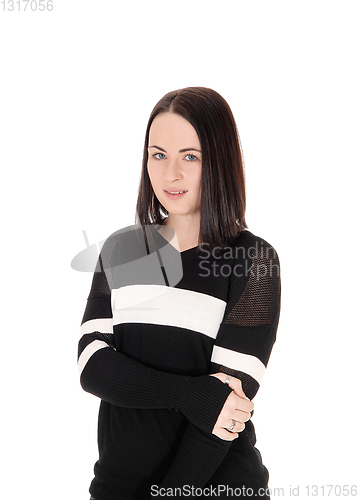 Image of Close up of a woman with her arms crossed