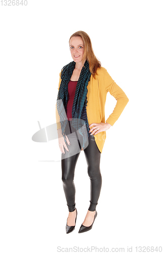 Image of Slim young woman standing, smiling