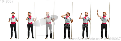 Image of Handsome man gondolier with oar isolated over white studio background
