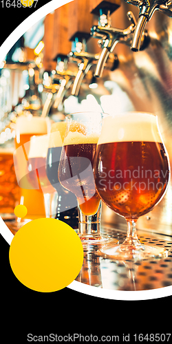 Image of Glasses with lager, stout beer on bar rack. Vertical banner, flyer for ad.