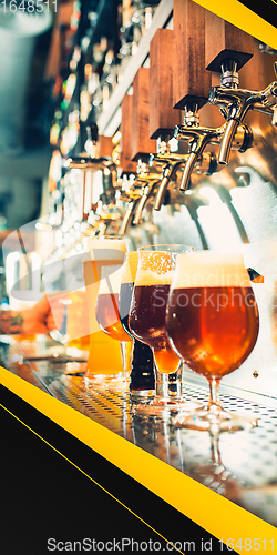 Image of Glasses with lager, stout beer on bar rack. Vertical banner, flyer for ad.