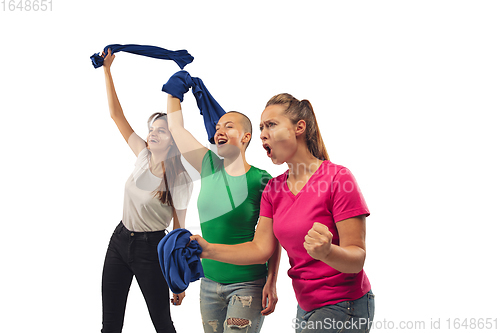 Image of Female soccer fans cheering for favourite sport team with bright emotions isolated on white studio background