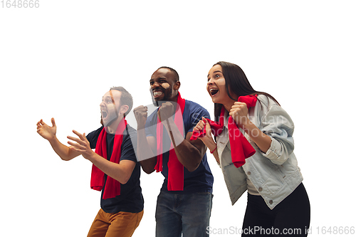 Image of Multiethnic soccer fans cheering for favourite sport team with bright emotions isolated on white studio background