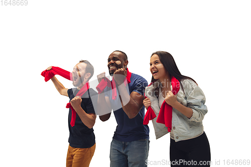 Image of Multiethnic soccer fans cheering for favourite sport team with bright emotions isolated on white studio background