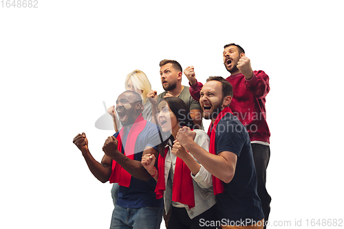 Image of Multiethnic soccer fans cheering for favourite sport team with bright emotions isolated on white studio background