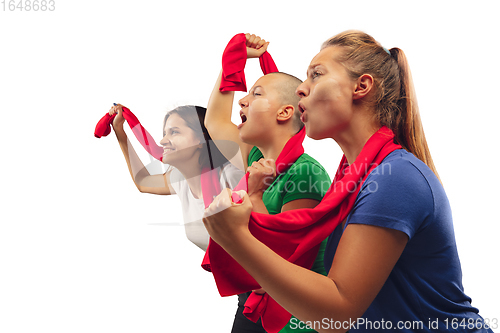 Image of Female soccer fans cheering for favourite sport team with bright emotions isolated on white studio background