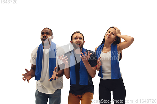 Image of Multiethnic soccer fans cheering for favourite sport team with bright emotions isolated on white studio background