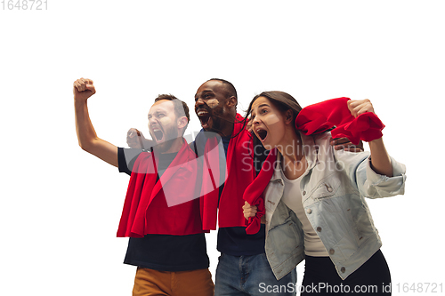 Image of Multiethnic soccer fans cheering for favourite sport team with bright emotions isolated on white studio background